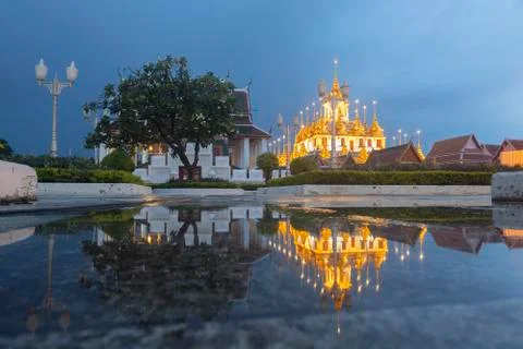 Reflection of Wat Ratchanatdaram Temple the beautiful golden castle or pagoda Stock Photos
