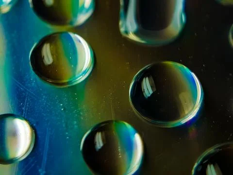 Reflection of water on CD discs. Stock Photos