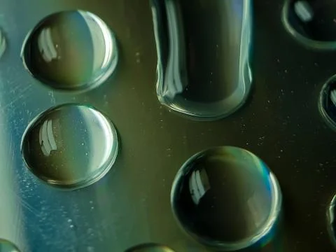 Reflection of water on CD discs. Stock Photos