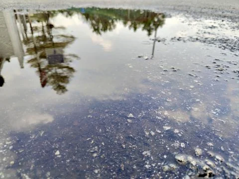 Reflection on the water on the road Stock Photos
