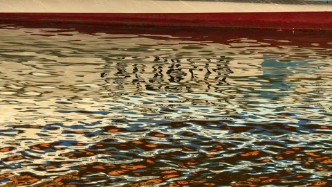 The reflection in the water of the sea bay of a small yacht Stock Footage 110857665