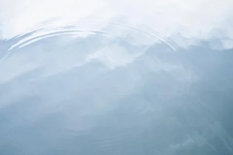 Reflection in the water of the sky Stock Photos