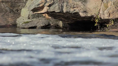 Reflection of water on stone mountain river Stock Footage 37270884