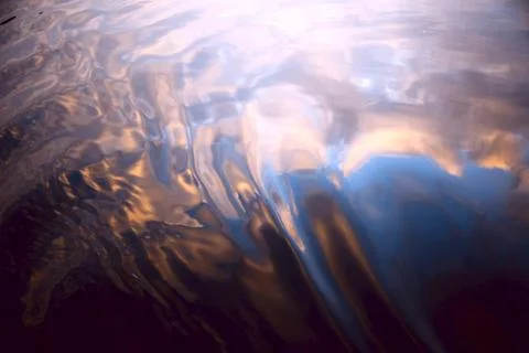 Reflection on water at sunset Stock Photos