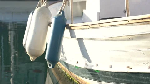 Reflection of the water surface on a white boat Stock Footage 241080560