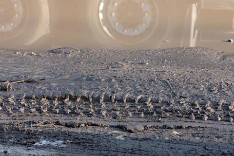 Reflection of wheels in a puddle on off-road Stock Photos