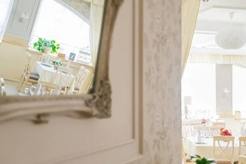 Reflection of white interior of modern restaurant Stock Photos