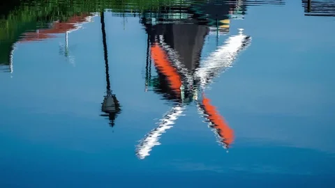 Reflection of a windmill in water, Amsterdam, Netherlands Stock Footage 90408560