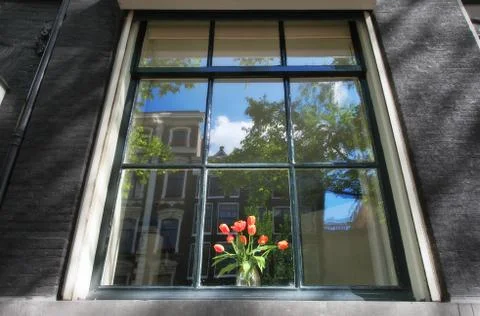 Reflection in window in amsterdam, netherlands. Stock Photos