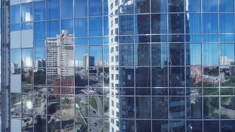 Reflection in the windows of a corporate building. Aerial video of Business Stock Footage 93123382