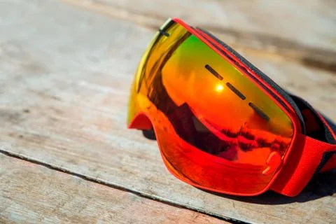 Reflection of the winter mountain landscape in a ski mask Stock Photos