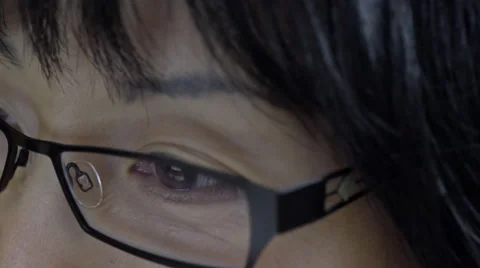 Reflection on woman's eyeglasses. 4K UHD. 스톡 동영상 49591185