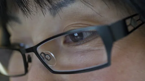 Reflection on woman's eyeglasses. 4K UHD. Stock-Footage 49595431