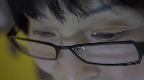 Reflection on woman's eyeglasses. 4K UHD. Stock-Footage 49596633