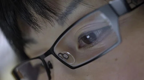 Reflection on woman's eyeglasses. 4K UHD. Stock-Footage 49599944