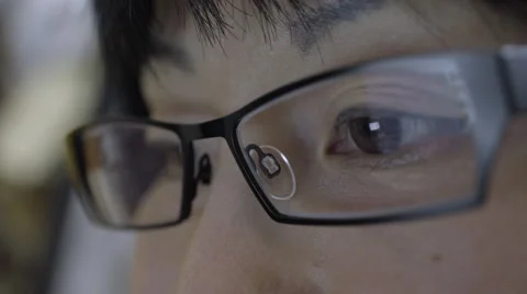 Reflection on woman's eyeglasses. 4K UHD. Stock Footage 49601826