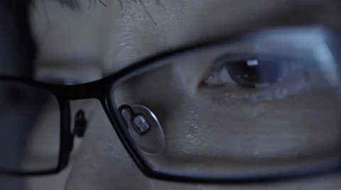 Reflection on woman's eyeglasses. 4K UHD. Video stock 49604871