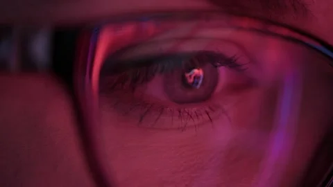 Reflection in women's glasses of graphs of trading close-up 動画素材 236299513