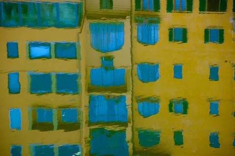 Reflection of Yellow building in Arno River in Florence Stock Photos