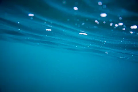 Reflections and bubbles underwater Stock Photos