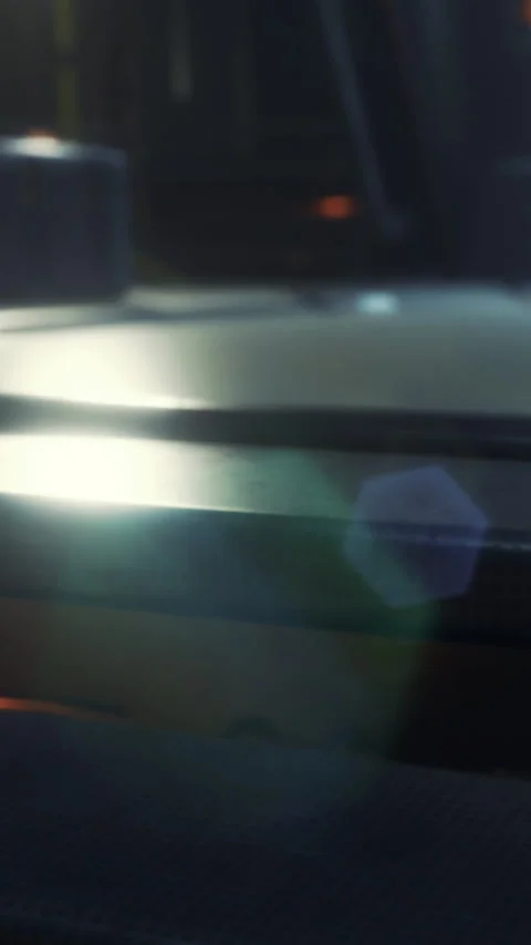 Reflections and light play on metallic surfaces in a modern setting Stock Footage 334204445