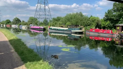 Reflections of barges in the River Lea at Walthamstow Stock Footage 156229742