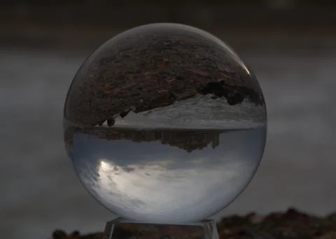 Reflections of the beach on the ball Stock Photos