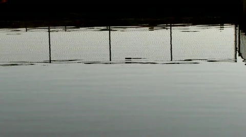 Reflections of beach boardwalk Stock Footage 110368