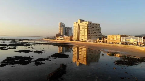 Reflections of Beach Road, Strand, Cape Town, South Africa Video stock 98609265
