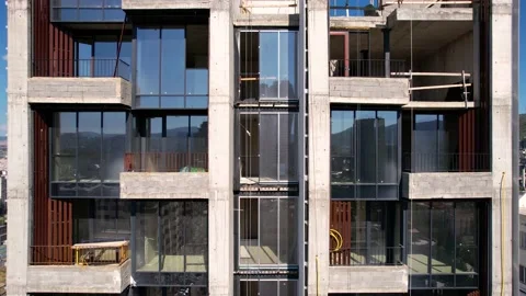 Reflections on the building construction windows Stock Footage 238802251