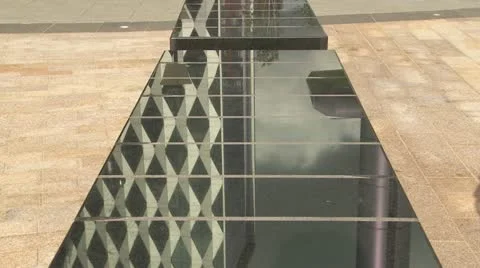 Reflections of buildings and people Stock Footage 12459448