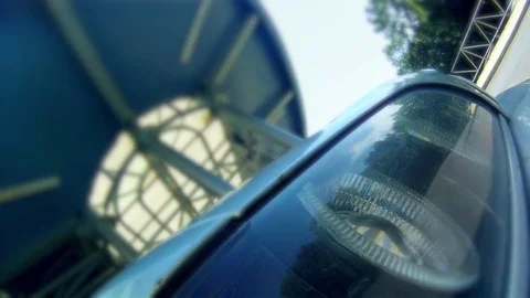 Reflections on the car's Headlight Stock Footage 76472536