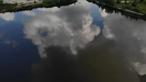 Reflections of clouds in the river. Drone view Stock Footage 155859641