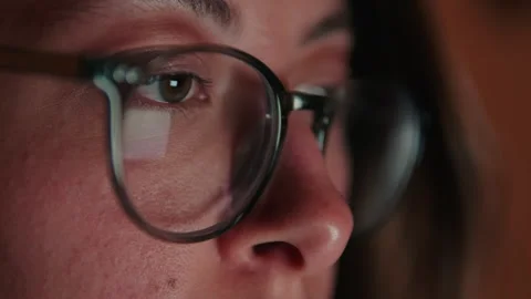 Reflections Of Digital Screen On Woman's Glasses Stock Footage 333151398