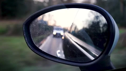 Reflections in a dirty car mirror Stock Footage 140796790