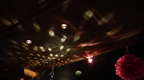 Reflections of disco mirror ball on ceiling Stock Footage 60054944
