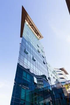 Reflections on glass facade Stock Photos