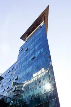 Reflections on glass facade Stock Photos
