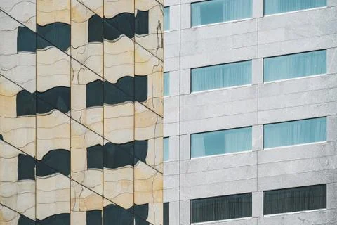 Reflections on a glass facade Stock Photos