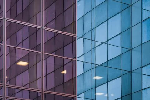 Reflections on a glass facade Stock Photos