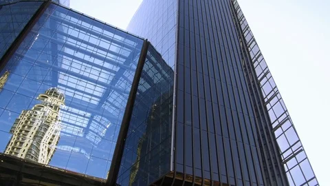 Reflections on glass fronted building in Sandton City Stock Footage 100662138