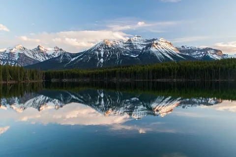Reflections on Herbert Lake, Alberta, Canada Stock Photos