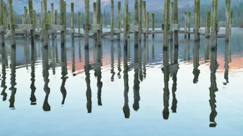 Reflections of jetty on a lake Stock Footage 316031273