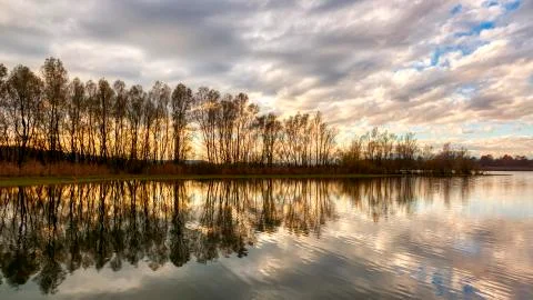 Reflections on the lake at sunset Stock Photos