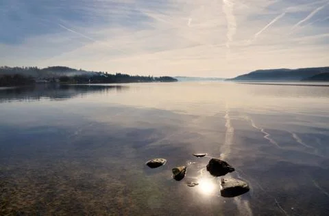 Reflections in lake windermere Stock Photos