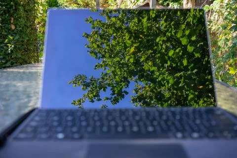 Reflections on a laptop Stock Photos