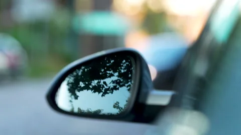 Reflections on the Left Side View Mirror Macro Shot Stock Footage 247502089