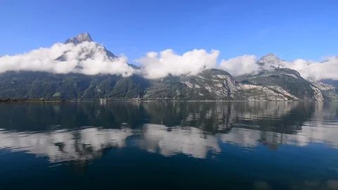 Reflections in the mirror of the lake. Video stock 79005428