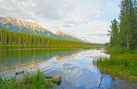 Reflections on a mountain lake Photos