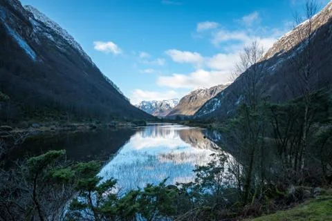 Reflections on mountain lake Stock Photos